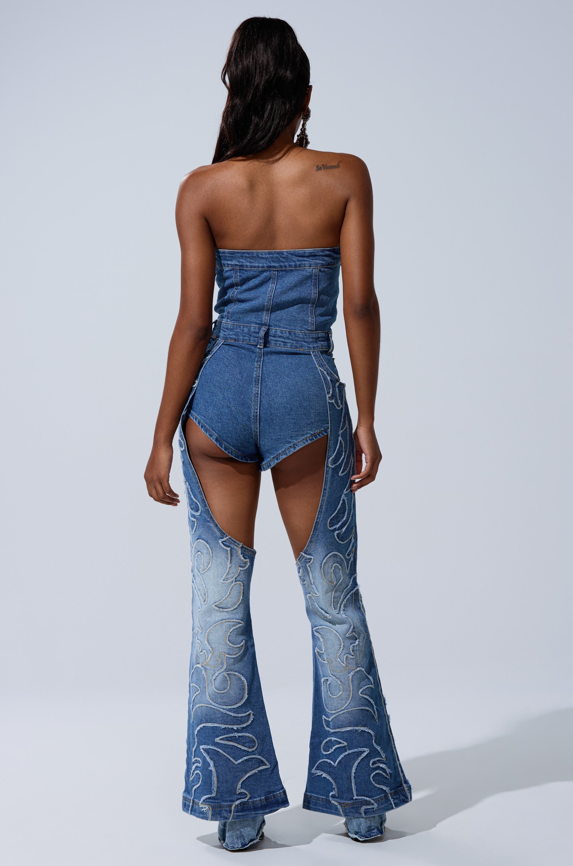 THROW DOWN DENIM JUMPSUIT WITH CHAPS